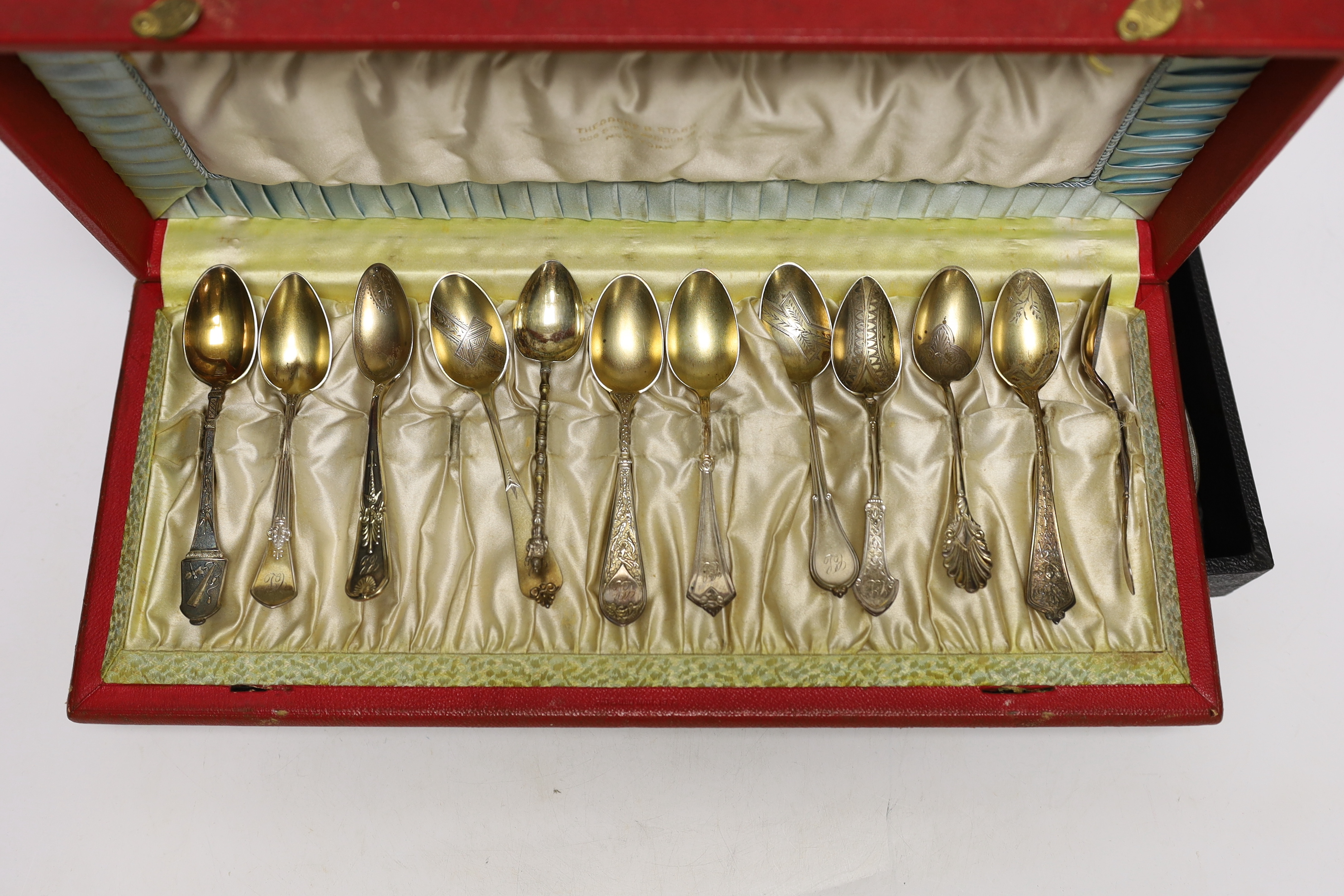 An Elizabeth II cased silver mounted three piece mirror and brush set, with RAF wings applique, twelve sterling spoons and a silver mounted glass preserve jar.